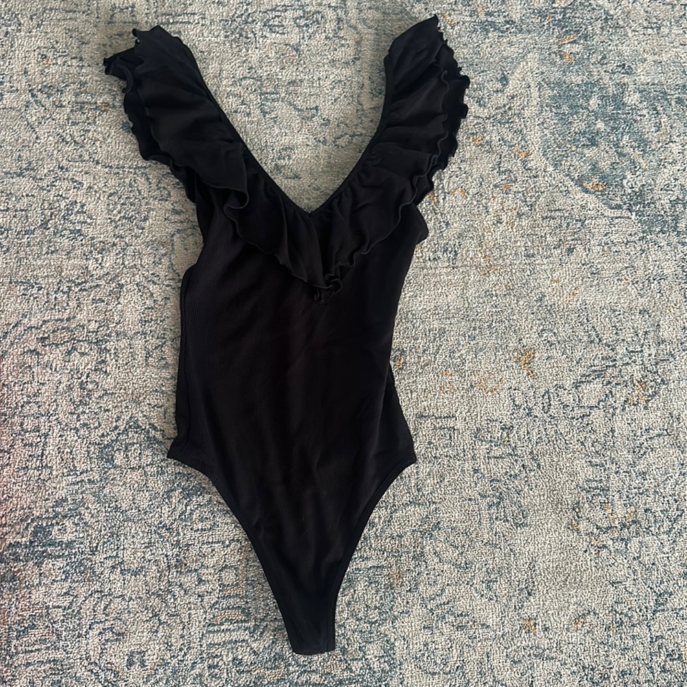 Off or on the shoulder black onesie Wilfred brand